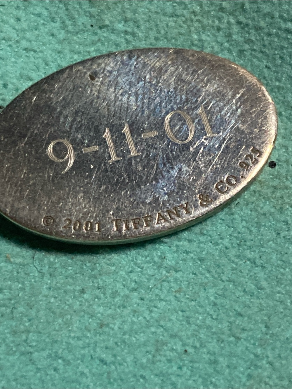 Tiffany & Co. Sterling Silver Oval 9/11 Engraved Bracelet Pendant - Silver